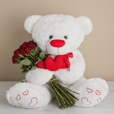 "Roses in the Arms of a Teddy Bear: The Perfect Gift"