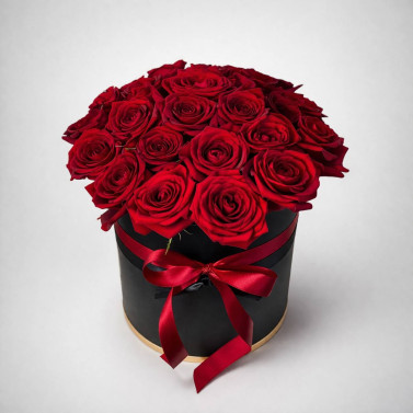 Composition funéraire de 26 roses en boîte