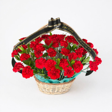 Corbeille funéraire de 50 œillets