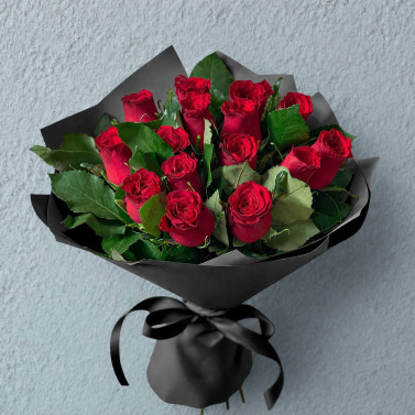 Composition funéraire de 16 roses rouges
